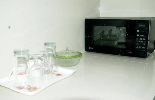 Delhi Apartamento | Apartamento de servicio amueblado para estadía mínima de 1 mes con cocina común
