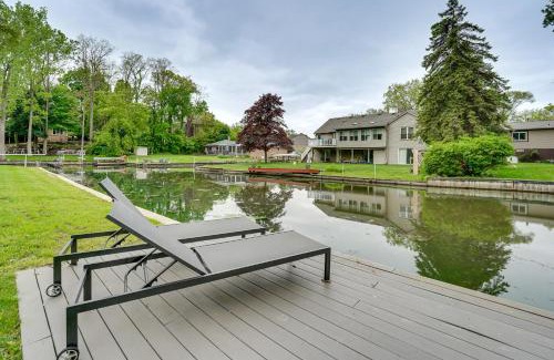 Commerce Township Casa | Game Room and Fire Pit Canal-Front Commerce Home
