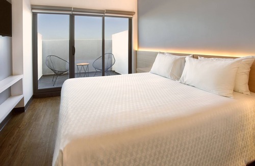 Zona 2 Extendida Hotel | Gamma Querétaro