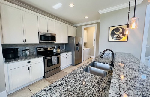 Salters Cove Casa | Garden City Pet friendly beach house! Golf car provided. 3 min ride to the beach