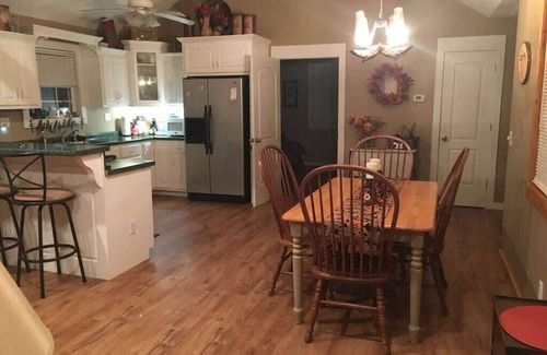 Spencer Cabina | Gas fireplace, firepit, and cedar Adirondack chair