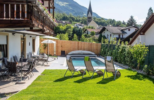 Vezzano Apartamento | Gemütliche Ferienwohnung mit Grossem Sonnenbalkon und Geheiztem Schwimmbad,