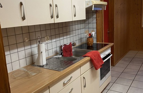 Fluehli Apartamento | Gemütliche Ferienwohnung im Torbach in Historischem Glaserhaus