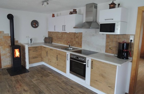 Zwolfhauser Apartamento | Acogedor apartamento en planta baja con jardín.