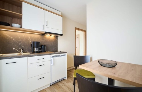 Riedenburg Apartamento | Acogedora suite para 1-3 personas con amplio balcón.