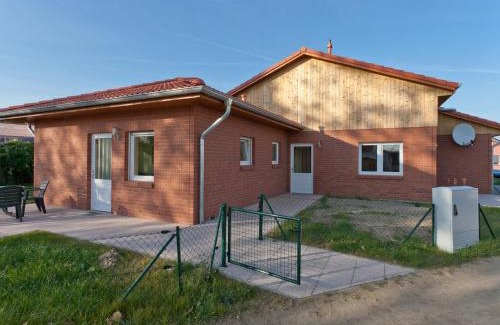 Zierow Apartamento | Gemütliches Appartement in Zierow mit Außenkamin