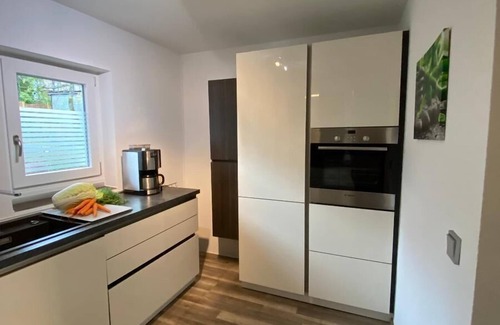Waldkirchen Apartamento | Gemütliches Ferienhaus für bis zu 10 Personen mit Garten, Terrasse, Grillmöglichkeit und Feuerstelle