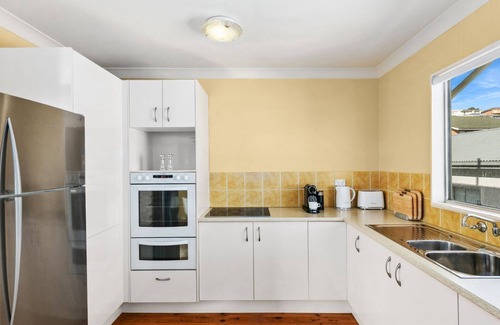 South Coast Casa | Gerroa House located mere steps from Seven Mile Beach.