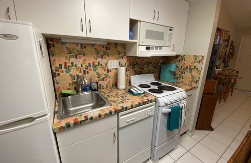 Paradise Lakes Condominio | Gettin' Freaky in the Tiki J-2 in Paradise Lakes NUDIST Community for Adult 30+