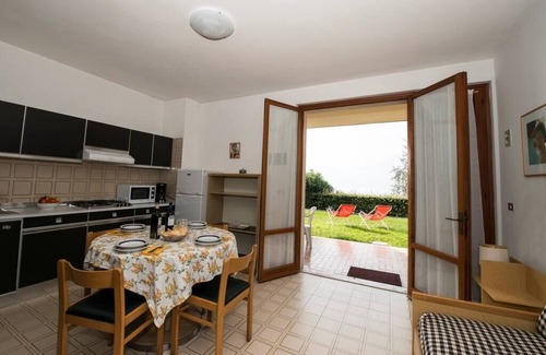 Frader Apartamento | Gianni with 1 bedroom with garden and lake view