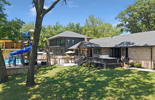 Grove Casa | Giant 10-bedroom lakefront home with large pool, hot tub, and dock
