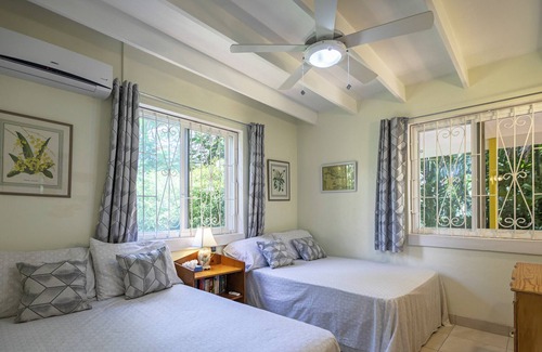 Gibbes Cabaña | Relajarse, actualizar y renovar en el entorno caribeño de Gibbs Palms.