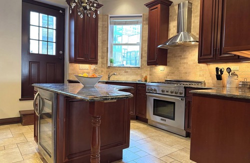 Gold Coast Casa | Gilded Age Gold Coast Mansion with Parking, Deck, Fireplaces