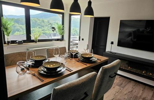 Niedersfeld Apartamento | Gipfelpanorama Winterberg mit Berg- und Seeblick, Boxspringbett mit ausfahrbarem TV