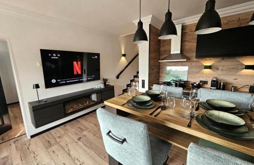 Niedersfeld Apartamento | Gipfelpanorama Winterberg mit Berg- und Seeblick, Boxspringbett mit ausfahrbarem TV
