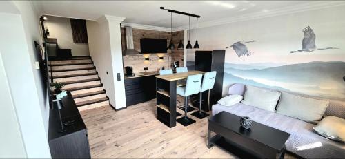 Niedersfeld Apartamento | Gipfelpanorama Winterberg mit Berg- und Seeblick, Boxspringbett mit ausfahrbarem TV