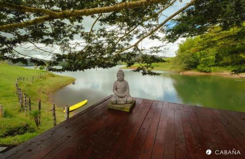 Yotoco Cabina | Glamping & Cabaña con Paddle, ducha al aire libre, Pet-friendly - Oasis junto al Lago