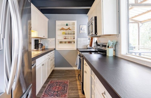 Covington Casa | Glass House on scenic Bogue Falaya river