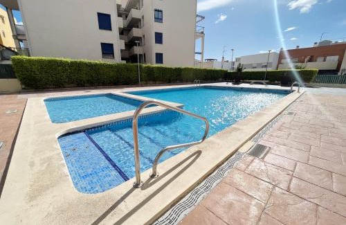 Canet de Berenguer Apartamento | Global Properties, Piso practico, con terraza y piscina en la playa de Canet