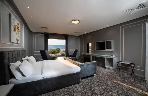 Al Hamra Hotel | Golden Garden Al Corniche Hotel