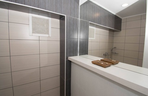 Kokkini Chani Casa | Golden Grain Suites by Checkin