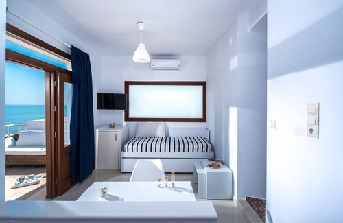 Kokkini Chani Casa | Golden Grain Suites by Checkin
