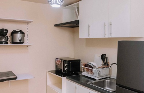 Mandurriao Condominio | Golden Sunset Skyline Retreat