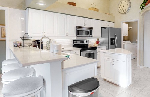 Long Meadow Casa | Golf course-view retreat with a private, heated pool, lanai, AC, & washer/dryer
