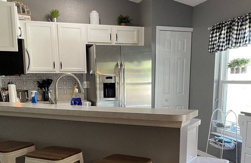 Florida Shores Casa | Gorgeous 3 bedroom home close to the ocean! With saltwater solar heated pool!