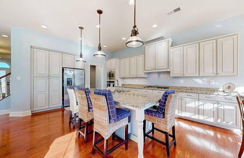West Beach Casa | Gorgeous Bay Forest home with resort amenities, raised patio, office, & firepits