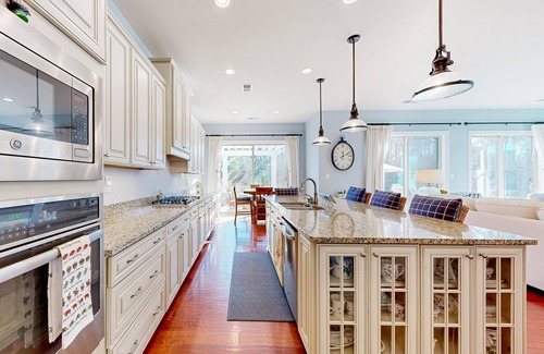 West Beach Casa | Gorgeous Bay Forest home with resort amenities, raised patio, office, & firepits