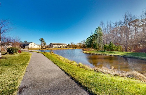 West Beach Casa | Gorgeous Bay Forest home with resort amenities, raised patio, office, & firepits