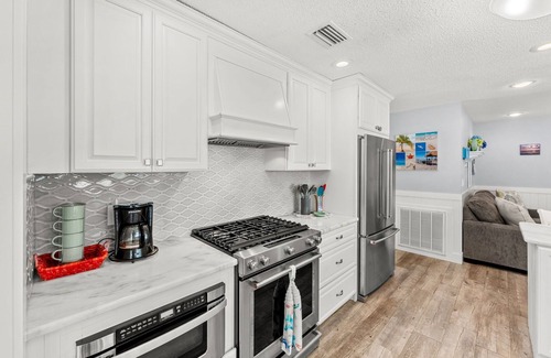 Venetian Way Casa | Gorgeous Beach House W/ Large Outdoor Patio, Heated Pool & Gas Fire Pit!