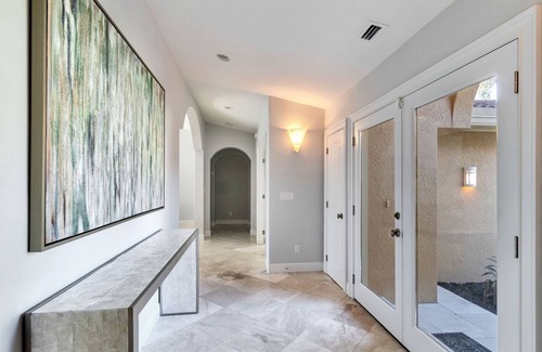 Shell Harbor Casa | Gorgeous newly renovated and professionally designed canal home.