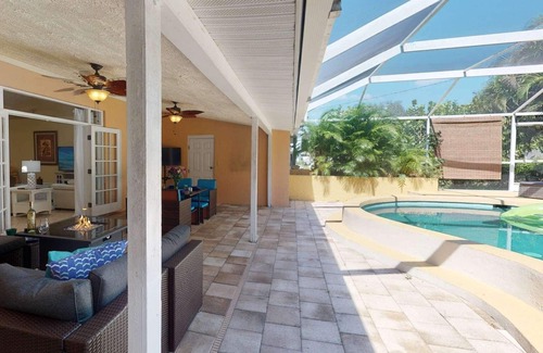 Bay Acres Casa | Gorgeous Updated Heated Saltwater Pool Home, WiFi, Dog Friendly, Kayak Launch & Park, Garage