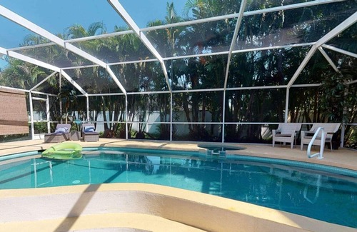 Bay Acres Casa | Gorgeous Updated Heated Saltwater Pool Home, WiFi, Dog Friendly, Kayak Launch & Park, Garage