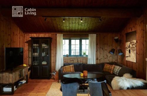 Nes Casa | Grand cabin at Nesfjellet with lovely view, inddor Jacuzzi & sauna