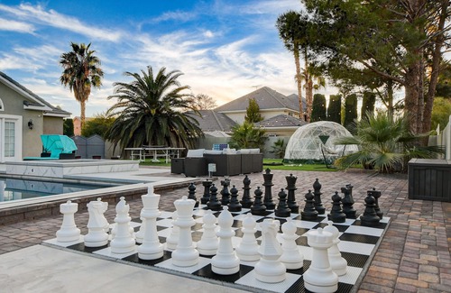 Southfork Casa | Grand custom home with resort-style backyard. 12 mins to the strip!
