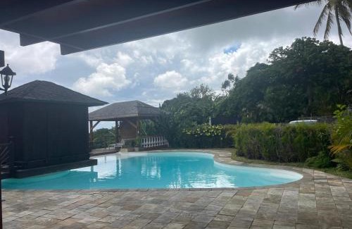 La Riviere Saint-Louis Casa | Grande Villa et Bungalows dans un Jardin créole avec Piscine et Vue Panoramique