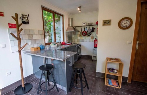 Currelos Apartamento | Granite-wall Luxury Cave on the Mondego River