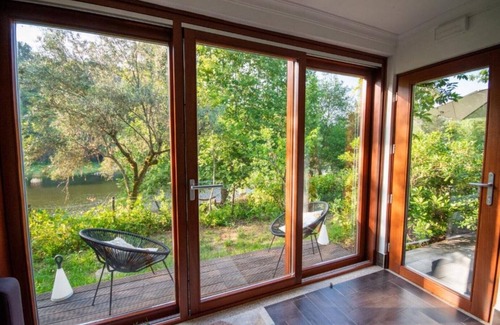 Currelos Apartamento | Granite-wall Luxury Cave on the Mondego River