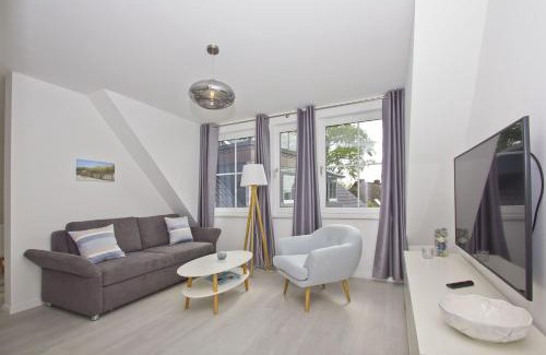 Gross Zicker Apartamento | gratis Nutzung vom AHOI Erlebnisbad und Sauna in Sellin - Haus Inselwind FeWo MEERwellen