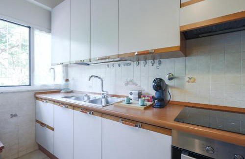 Quartiere XX Ardeatino Apartamento | Green Home Caravaggio