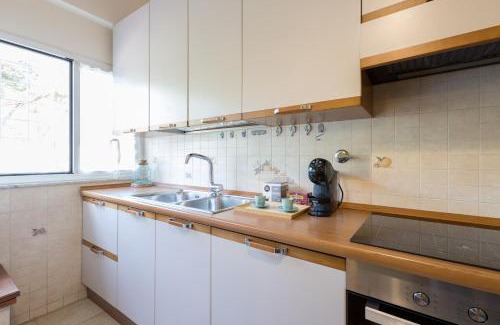 Quartiere XX Ardeatino Apartamento | Green Home Caravaggio