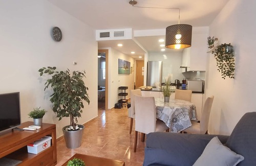 Playa de Vera Apartamento | Apartamentos Paraiso, Bajo B a pie de playa, piscina privada con jardín, WIFI