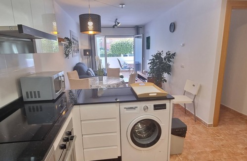 Playa de Vera Apartamento | Apartamentos Paraiso, Bajo B a pie de playa, piscina privada con jardín, WIFI