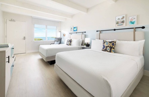 New Town Hotel | Group Getaway in 3 Ocean-View Rooms | Blue Flamingo Resort Key West with Pools