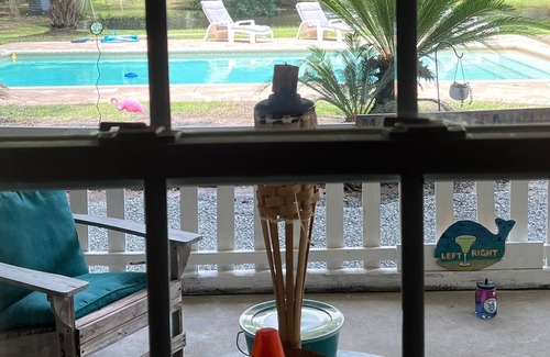 Surfside Beach Cabaña | Guest Cottage overlooking the pool.