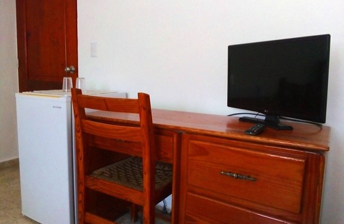 El Batey Apartamento | Guest-friendly room in central Sosua, pool/Wifi/cable TV, near everything