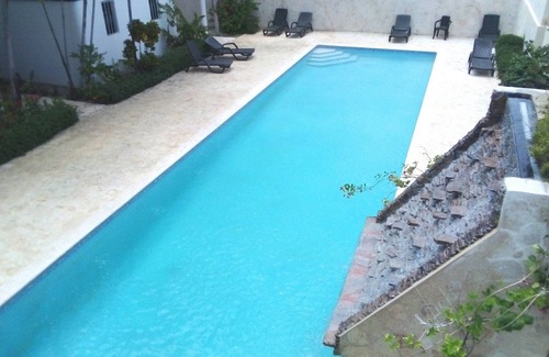 El Batey Apartamento | Guest-friendly room in central Sosua, pool/Wifi/cable TV, near everything